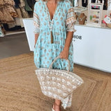 MANA | MIDI DRESS WITH FLORAL PATTERNS AND V-NECK