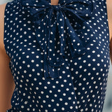 Chic Navy Blue Polka Dot Sleeveless Blouse With Bow Tie Neck