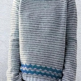 Women's casual sweater with subtle stripes