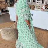 MANA | MIDI DRESS WITH FLORAL PATTERNS AND V-NECK