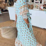 MANA | MIDI DRESS WITH FLORAL PATTERNS AND V-NECK