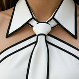 Stylish Sleeveless Halter Neck Blouse With Bold Contrast Trim