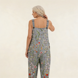 Jumpsuit - Jumpsuit with a luminous flower meadow pattern in gray with flowers