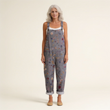 Jumpsuit - Gray jumpsuit with a bright floral pattern in dark with flowers