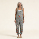 Jumpsuit - Jumpsuit with a luminous flower meadow pattern in gray with flowers